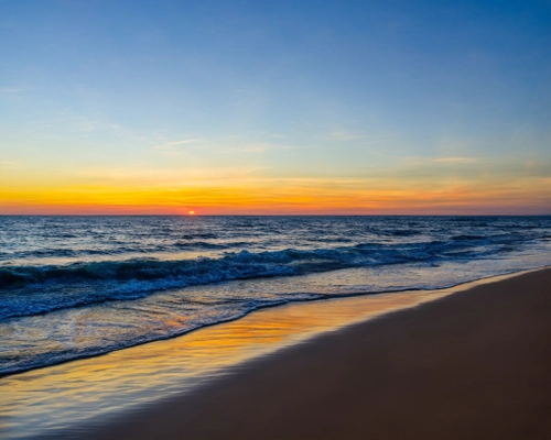 Serene Sunset at Sea FREE Stock Photo, sunset,  ocean,  beach picture