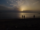 Relaxed figures on beach during warm sunset FREE Stock Photo, sunset,  beach,  serenity picture